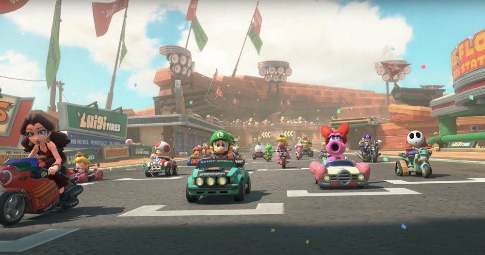 Image showing various Mario Kart World characters speeding through the open world